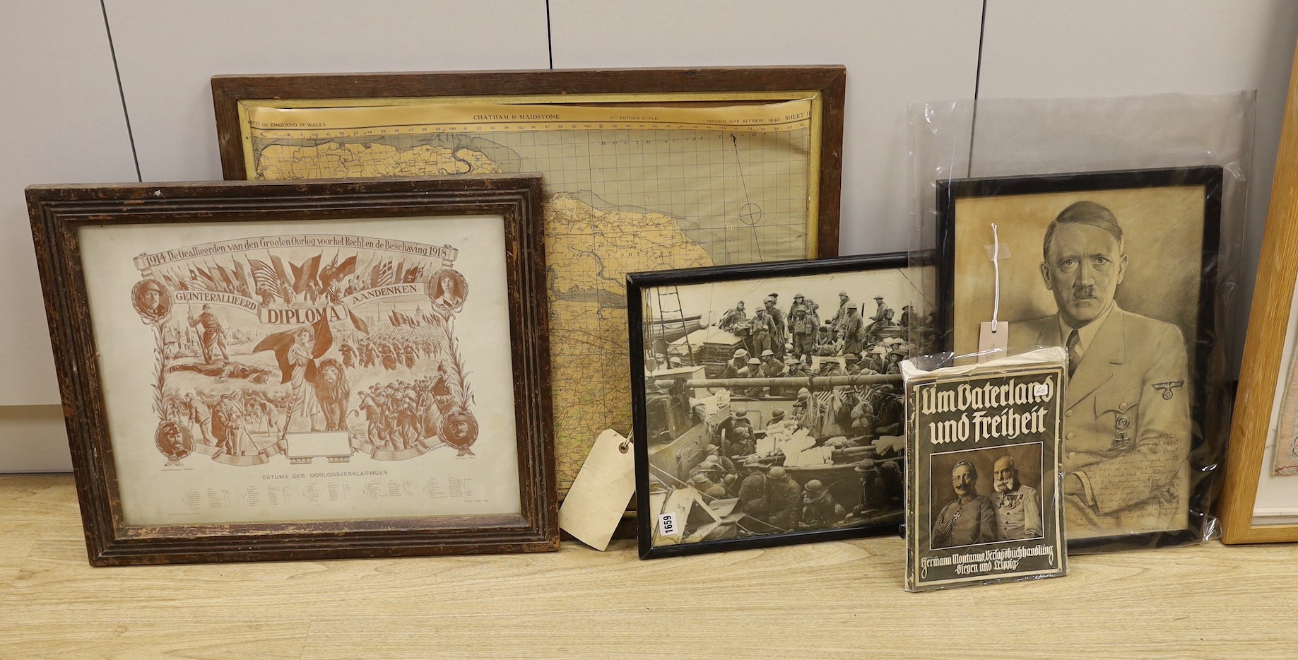 A German monochrome 1914-18 propaganda print, frame 60cm wide, an assortment of World War Two maps and two leather satchels